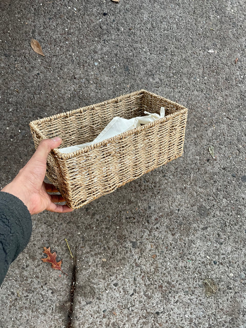 A Woven Basket Perfect to Hold 2 Rolls of TP