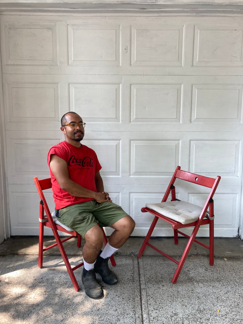 Two Foldable Red Chairs With Cushions