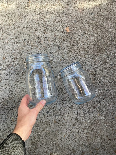 Two Clear Glass Mason Jars