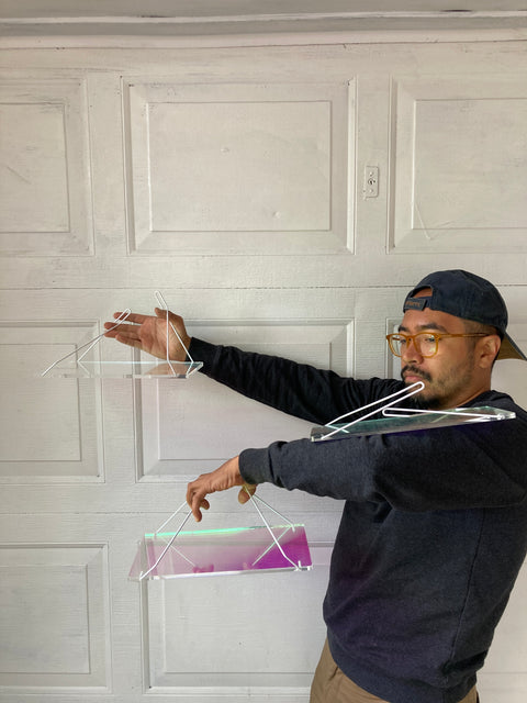 Three Hanging Iridescent Plastic Shelves