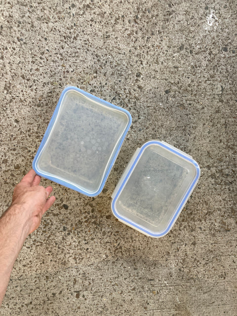 Two Medium Size Glass Tupperwares