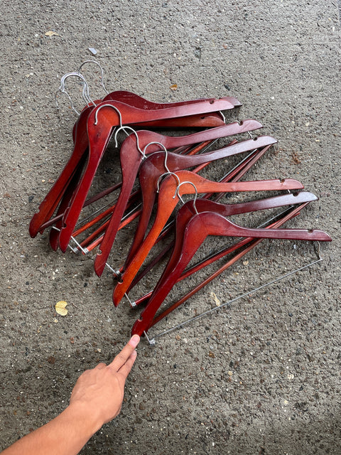 Bunch of Cherry Colored Hangers