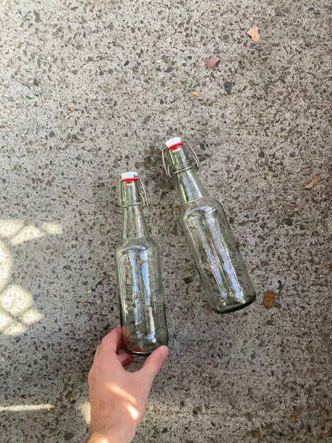 Two Swing Top Glass Bottles