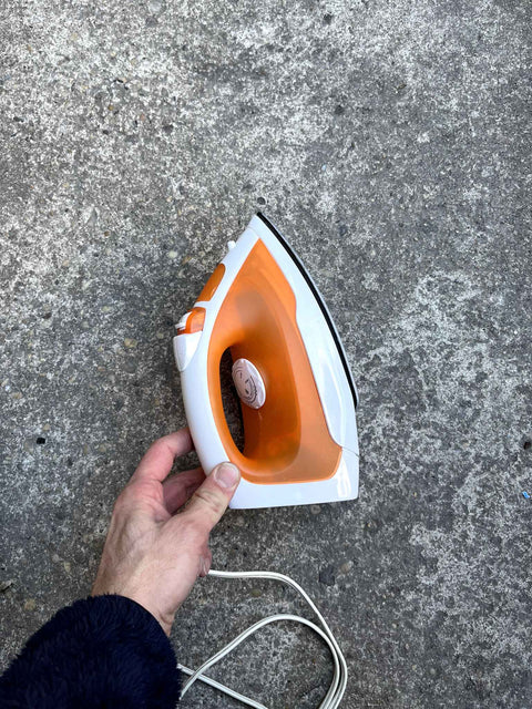 A Very Orange Steam Iron