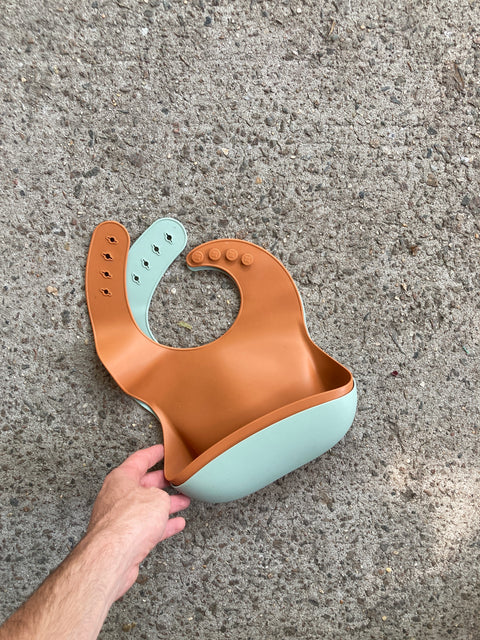 Two Like New Mushie Silicone Bibs