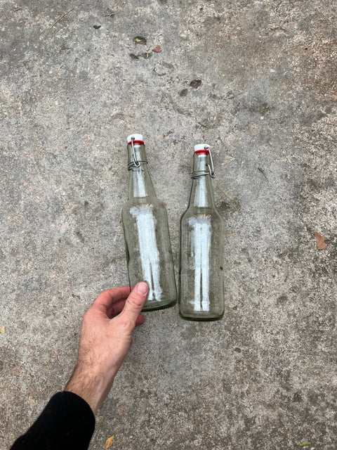 Two Swing Top Glass Bottles