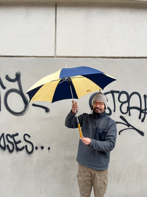 A Pretty Umbrella With A Wood Handle