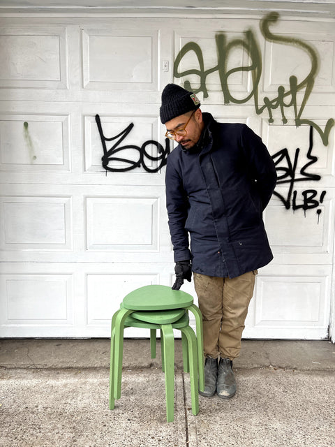 Three Green Stacking Wood Stools