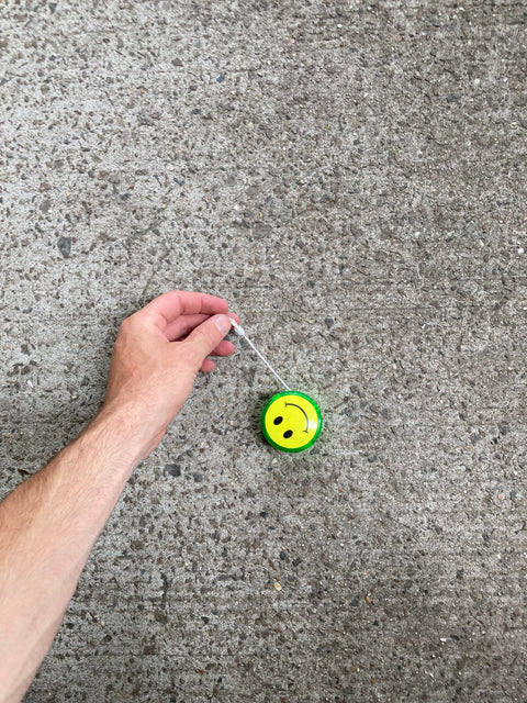 Smiley Face Yoyo That Makes Light