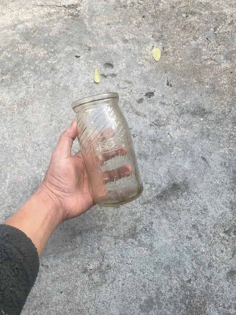 A Large Old School Vintage Milk Bottles