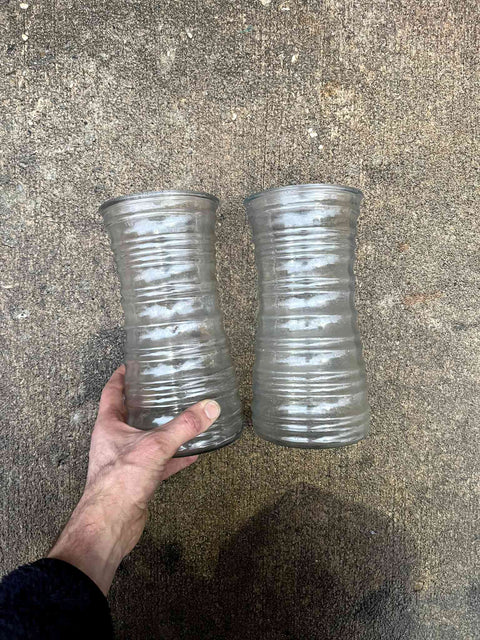 Two Tall Clear Ribbed Vases